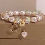 Pulsera de cristales con dijes